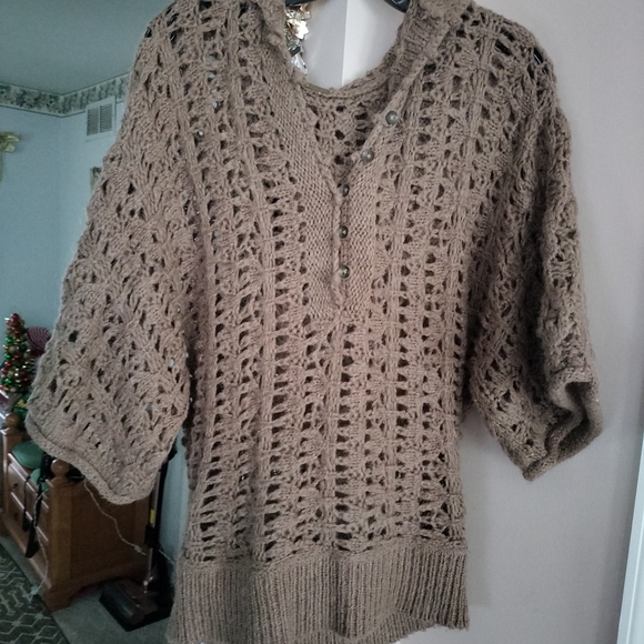 This is a Free People Pointelle Open Knit Alpaca Hooded Sweater in brown. Small - Picture 3 of 13